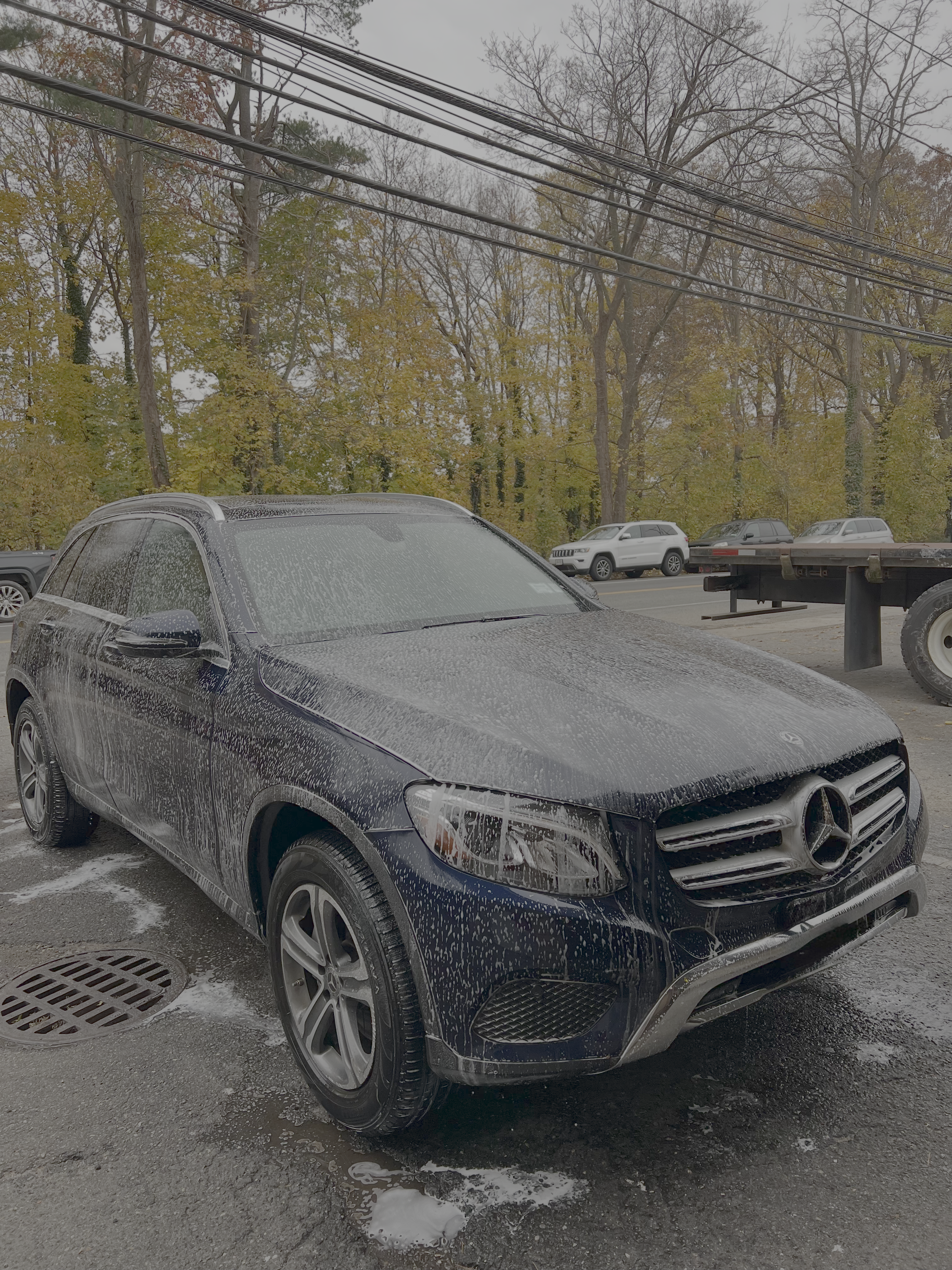 Mercedes GLC300 being hand washed with premium soap